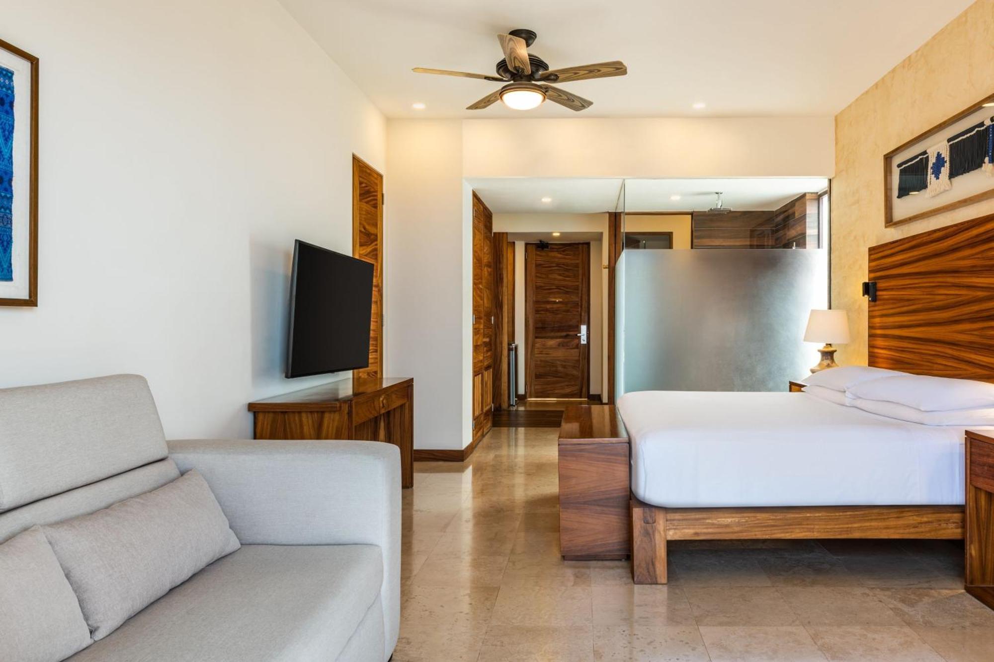 Deluxe Bay View, All-Inclusive, Guest room, 1 King, Sofa bed, Balcony